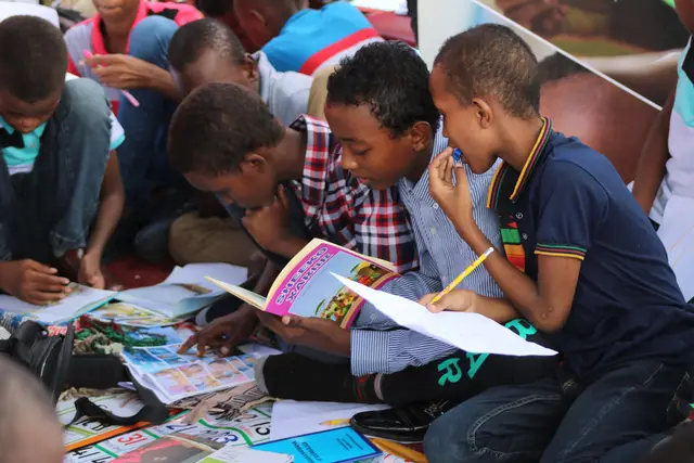 Children reading and learning together